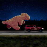 Dinosaur nugget chasing car