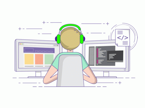 Man sitting in front of computer screens coding