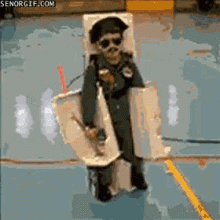 Boy in cardboard Transformers costume