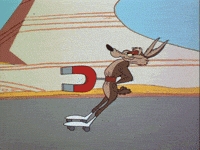 Wile E. Coyote on rollerskates, being pulled by a big magnet