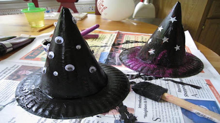 Two witch's hats made from cones and paper plates